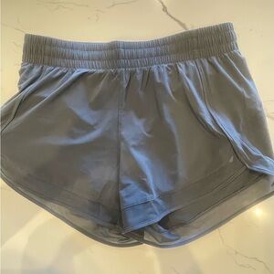 Athleta mesh racer run mid rise 4” short
